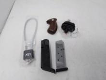 2 gun locks-45 magazine-9mm mag box only & set of grips