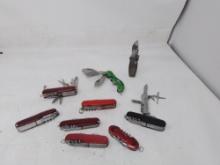 Bag lot of 10 pocket knives (Swiss Army)