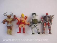Four Power Rangers Villain Action Figures including Lord Zedd, Evil Space Aliens Head Butting