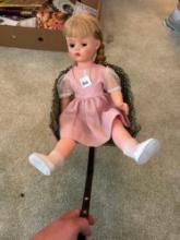 2 wheel pull type wicker buggy with doll.