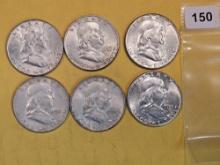 Six silver Franklin Half Dollars