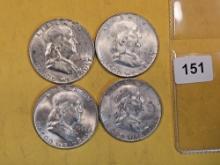 Four About Uncirculated Franklin Half Dollars