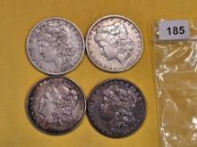 Four Mixed Silver Morgan Dollars