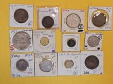 Twelve mixed World Coins