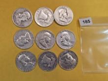 Nine silver Franklin Half Dollars