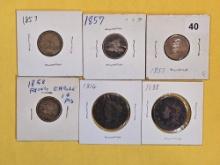 Six mixed small and large cents
