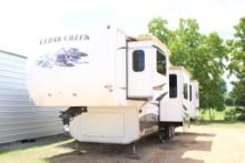 2013 CEDAR CREEK CAMPER, HAS TITLE, 5 slide outs, spacious seating area wit