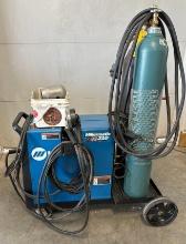MILLERMATIC 210 WIRE WELDER WITH ALUMINUM SPOOL GUN AND ONE ARGON & ONE NOS TANK