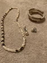 Necklace earrings, and a bracelet costume jewelry