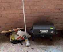 small grill happy Easter sign a bag for a casserole dish no dish and a mop