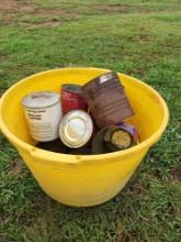 plastic bucket and empty coffee cans