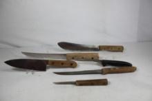 Six Chicago Cutlery knives.