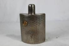 Hammered silver colored whiskey flask. Used, in nice condition.