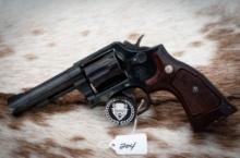 Smith and Wesson model 10-8, 38 S&W Special, 4 inch barrel, serial number AUF1104