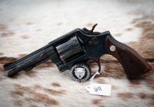 Smith and Wesson, Model 10-10, 38 Smith and Wesson special, 4 inch barrel blued, serial number BRH14