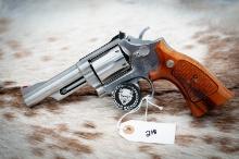 Smith and Wesson model 66-2, 357 caliber with 4 inch stainless, serial number AAU7989