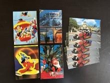 9 Disney Postcards 1 is a Mickey Sticker, 1 is from Epcot, the rest from Italy and Disneyland All Un