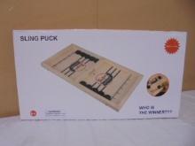 Wooden Sling Puck Game