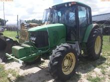 7-01130 (Equip.-Tractor)  Seller: Florida State F.W.C. JOHN DEERE 6420 ENCLOSED