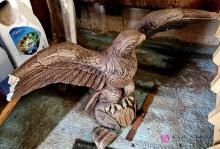 concrete eagle statue needs repair