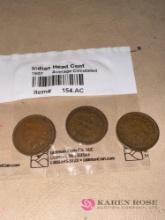 three Indian head pennies