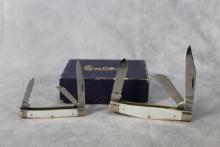 TWO QUEEN CUTLERY MOTHER OF PEARL KNIVES WITH NON MATCHING BOX