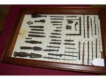 Gunsmithing tools from late 1800's  in display case.  Used to build muzzleloading rifles.
