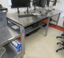 industial work table with stainless top adustable height 96" long x 36" deep with unders shelf
