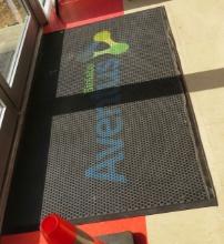 rubber rain mats for fron door  58" x 34" deep with company logo