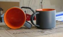 1 case of 36 coffee mugs (orange inside and gray outside)