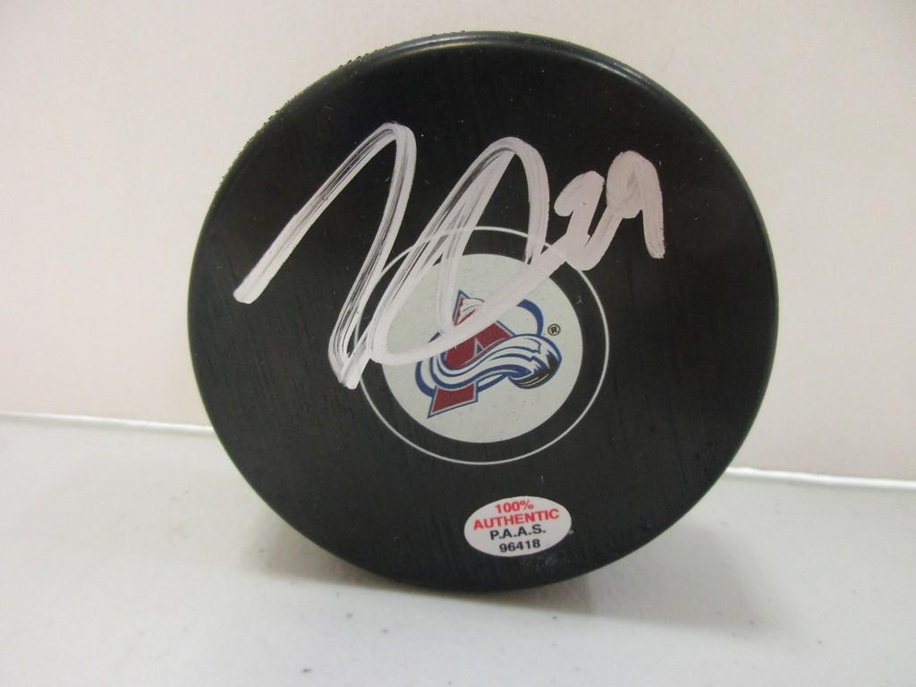 Nathan Mackinnon of the Colorado Avalanche signed autographed logo hockey puck PAAS COA 418