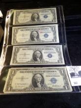 (3) Series 1935E & 1935F One Dollar Silver Certificates in a plastic page.