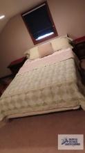 Queen size bed with Hollywood frame and reversible bedspread and pillows