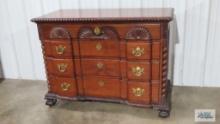 Antique mahogany four drawer dresser base...with wheels and ball and claw feet. 35-1/2 in. tall by 4