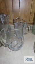 Two glass pitchers