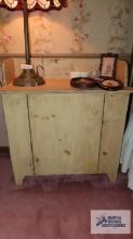 rustic cabinet with storage. top has been cut for cord