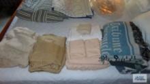 lot of assorted throws, sheet sets, pillow cases and etc