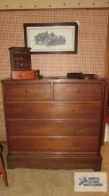 Cherry finish chest of drawers on second floor