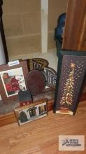 lot of Christmas scene wall hangings, hope sign and etc