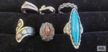 Six costume jewelry rings