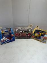 M&M Firetruck, Make A Splash, and Helicopter Collectibles