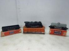 Lionel Train Engine, Log Car, and Tanker Car