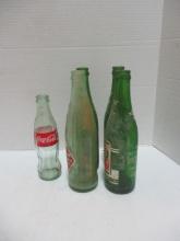 Five Old Soda Bottles