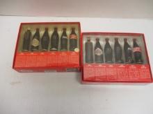 Two Coca-Cola Collector Sets of "The Evolution of the Coca-Cola Contour Bottle"