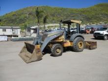 2012 John Deere 210K Skip Loader,