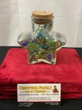 Star Shaped Glass Bottle w/ Glass Marbles inside, roughly 40-50 pieces