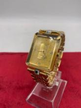 Croton 23kt gp swiss quartz Credit Suisse wristwatch w/ 999.9 fine gold 1 gram ingot face