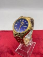 Invicta gold tone Rotomatic 50m quartz 20j wristwatch with skeleton back and blue face