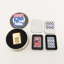 3 NASCAR & Indianapolis Zippo lighters with tins