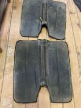 Two 1/2 inch horsehair cutback saddle pads with sleeve for shims. Fleece saddle pad.